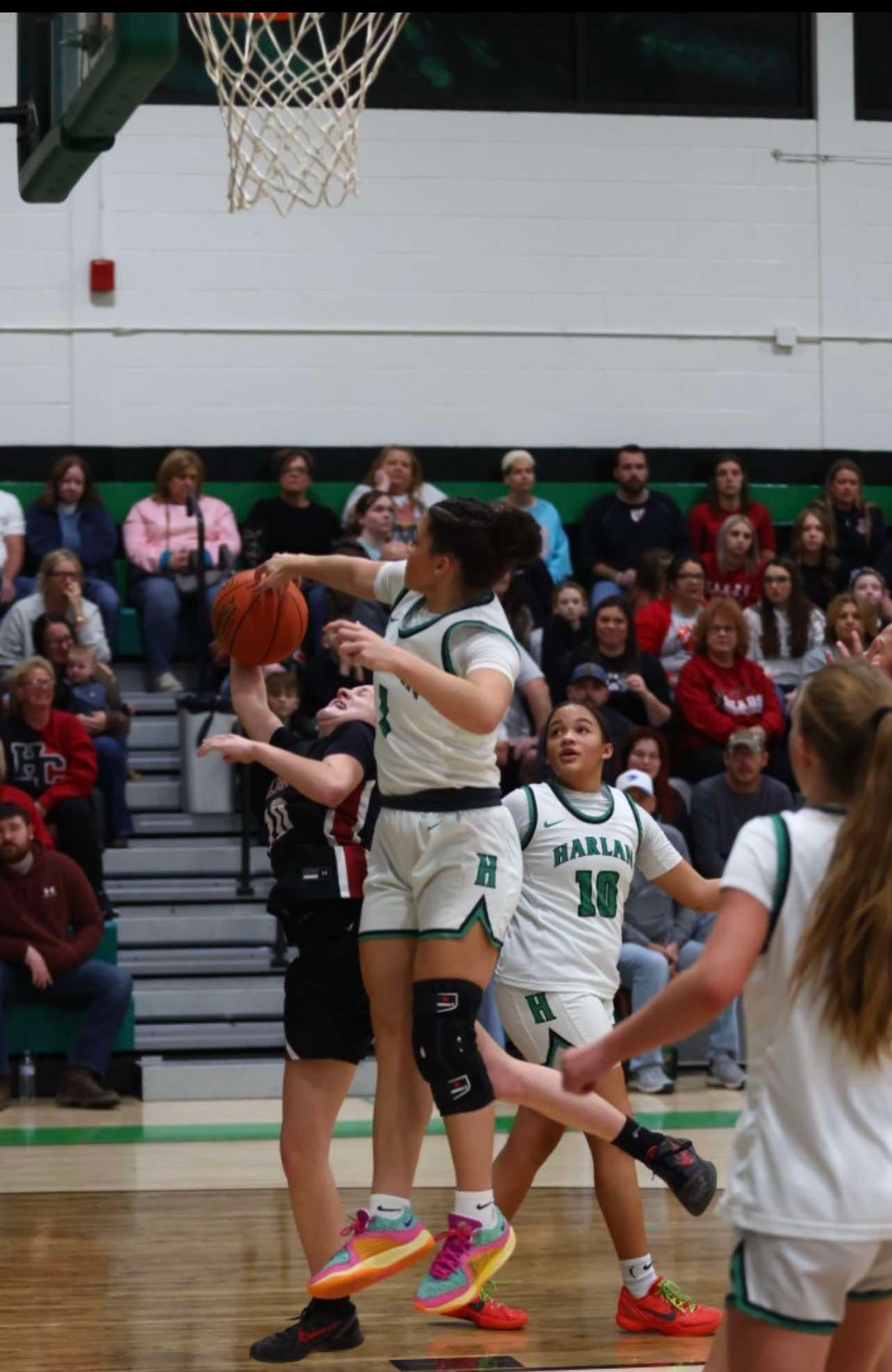 Lady Dragons answer HC’s late surge to hang on for district win